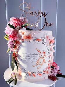 Flower Bunny Stormi turns One Hand Writing Custom Name & Age First Birthday Cake Topper